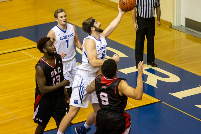 MEN'S BASKETBALL DEFEAT VIKINGS IN OVERTIME